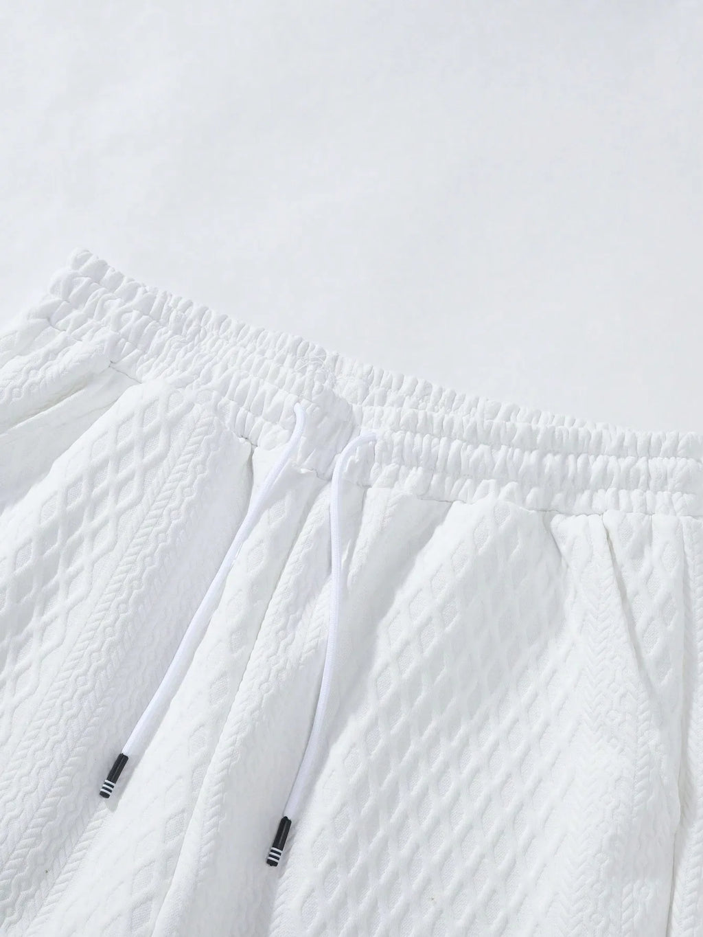 Ensemble chemise à manches courtes texturée et short pour homme Ensemble décontracté deux pièces Vêtements de rue légers pour l'été