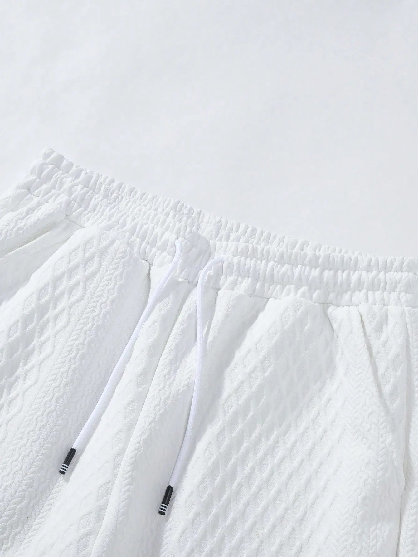 Ensemble chemise à manches courtes texturée et short pour homme Ensemble décontracté deux pièces Vêtements de rue légers pour l'été